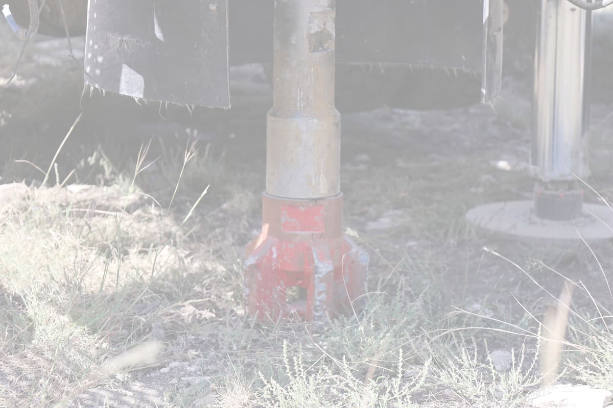 Close-up of a rotary drill bit used by Triangle J Water Wells